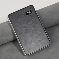 Batterie externe magnétique sans fil avec étui en cuir véritable, affichage LED, chargeur portable compact et fin, trou pour cordon, fabrication OEM ODM