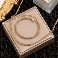 Bijoux en acier inoxydable Shiloh en gros, ensemble collier et bracelet en bambou vintage tendance, ensemble chaîne circulaire en maille métallique