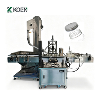 Machine de mise en bouchon automatique à grande vitesse pour bouteilles rondes