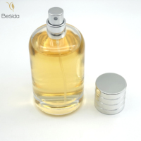 Bouteille de parfum rectangulaire personnalisée de 100ml avec pulvérisateur à pompe en verre vide et bouchon en plastique en forme de cylindre