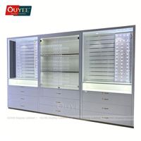 Elegante Expositor Giratorio Plegable para Joyería con Panel Perforado para Diseño de Interiores de Joyerías