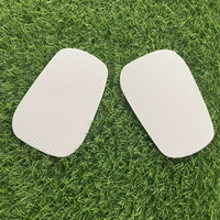 Nouveauté 2024 Eubi RYD687 Protège-tibias de football blancs en PU, style casquette, chauffants et moulables, protection intégrale