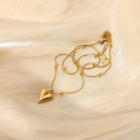 Collier tendance en acier inoxydable plaqué or 18 carats avec pendentif cœur et chaîne à billes - Cadeau pour femme