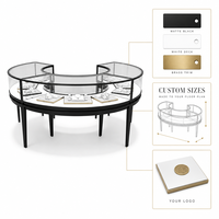 Comptoir de présentation de bijoux rond sur mesure avec vitrine incurvée en verre et éclairage LED pour mobilier de magasin de bijouterie