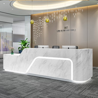 Réception de spa moderne pour salon de beauté réception en béton marbre LED personnalisée modèles