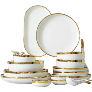 Juego de vajilla de cerámica blanca con borde dorado de lujo, juego de platos y cuencos de porcelana para Cocina