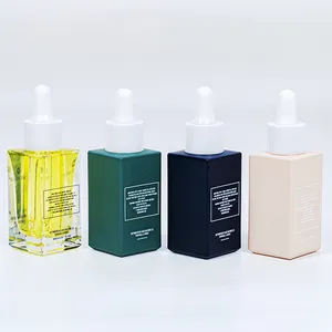 Botella de vidrio esmerilada cuadrada para aceite esencial de la piel, 30ml, 50ml, color rosa, amarillo, verde y azul