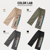 Pantalon de survêtement personnalisé pour homme, bleu et orange contrastés, en nylon léger, coupe large, avec ourlet réglable à cordon, pantalon de sport athlétique