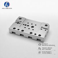 Plaque de montage personnalisée pour module linéaire en acier inoxydable/aluminium usinée CNC 3/4/5 axes, avec rainures en T et perçage multi-trous, usinage par électroérosion à fil