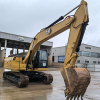 Excavatrice CAT 320GX d'occasion, 19,8 tonnes, adaptée aux travaux agricoles, en stock pour livraison rapide.