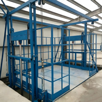 Plateforme élévatrice verticale hydraulique pour charges lourdes avec rail de guidage pour usine logistique