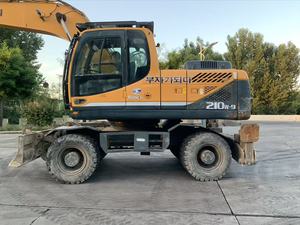 Excavatrice d'occasion HYUNDAI 210W-9 de haute qualité, ainsi que des excavatrices hydrauliques et sur roues à faible kilométrage 150W 210W-7 - Product Image 4