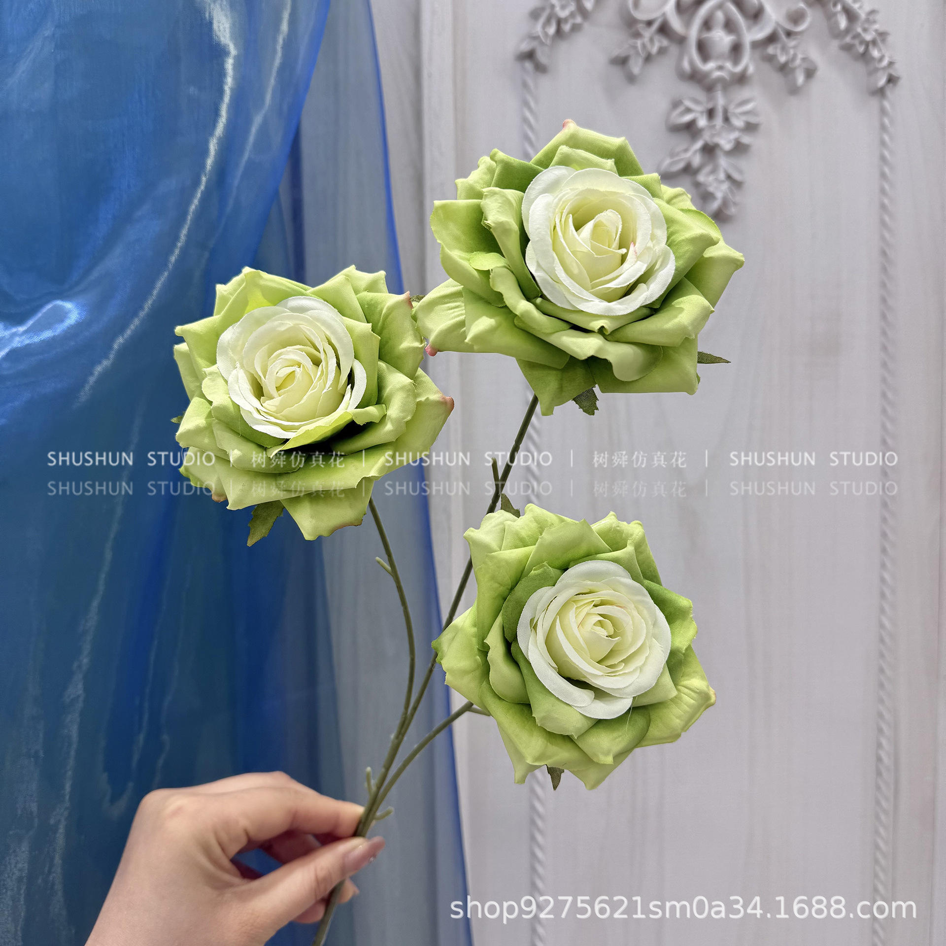 Bordure rose-vert bouclée à 3 têtes