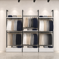 Présentoir à vêtements double niveau en métal noir avec tringle de suspension, étagères et tiroirs inférieurs – Vente en gros