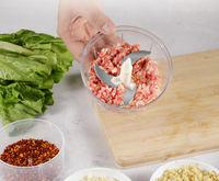 Handmatige keukenhulp voor het snijden van knoflook, groenten, fruit, gember, ui en vlees; mini handmatige blender met trekkoord.