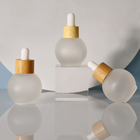 Nouvelle bouteille en verre pour huile essentielle avec bouchon en bambou, 20 ml, 30 ml, 50 ml, forme ronde, verre givré, flacon compte-gouttes