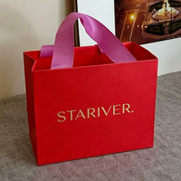 Sac shopping en papier de luxe orange personnalisé avec ruban rose, poignée et logo en feuille d'or, sac cadeau pour boutique de cosmétiques et de vêtements