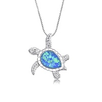 Vente en gros de bijoux animaux en argent sterling 925 collier pendentif en forme de tortue de mer en opale bleue incrustée de pierres précieuses