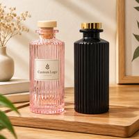 Bouteille diffuseur de parfum en verre transparent moderne, sur mesure, avec un design unique