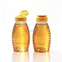 Vente en gros de bouteilles de miel en PET de 250 g avec valve anti-fuite