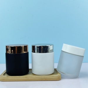 Tarro de Crema Redondo de Vidrio Esmerilado Negro/Blanco de Lujo de 200g, Baja Transparencia, con Tapa Dorada/Plateada - Product Image 1