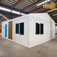 Maison conteneur modulaire préfabriquée de luxe extensible et respirante, à ossature en acier, 3 chambres, panneaux muraux nervurés blancs, pour école ou magasin