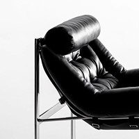 Fauteuil design en acier inoxydable et cuir véritable, style rétro décontracté, noir, pour l'extérieur ou la chambre.