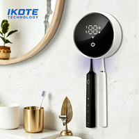 Brosse à dents électrique stérilisée aux ultraviolets 2026 avec capteur intelligent et support mural amovible pour séchage et désinfection des brosses à dents