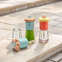 Emballage de gloss à lèvres rond de luxe de 4 ml, tube rouge rose en forme de cœur, applicateur en plastique avec bouchon à vis pour les cosmétiques de fard à joues