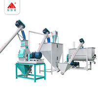 Ensemble complet de moulin à marteaux et mélangeur de type goutte d'eau pour la production de poudre d'aliments pour animaux