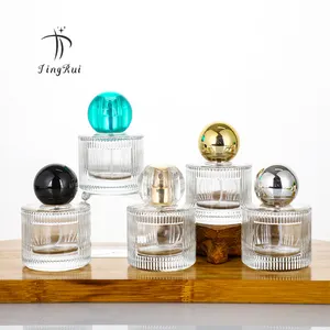 Nuevo estilo de lujo personalizado claro 30ml 50ml Spray botellas de perfume de vidrio recargables vacías con tapa dorada