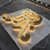 Letras Retroiluminadas de Acero Inoxidable con Baño de Titanio Dorado de Alta Gama |   Letreros de Entrada Personalizados para Publicidad Exterior de Alta Calidad