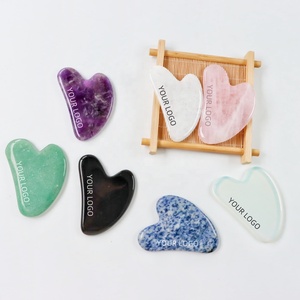 Outil de massage facial et corporel Gua Sha en quartz rose, pierre Bian, jade véritable et cristal de quartz avec logo personnalisé - Product Image 1