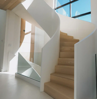 Escalier en volant ultra moderne et courbé, conçu pour les penthouse de grande hauteur