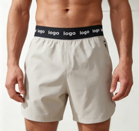 Shorts de sport pour hommes OEM en polyester écoresponsable et élasthanne 160 GSM, certifiés CE Intertek, avec entrejambe de 5 pouces, ourlet fendu et séchage rapide