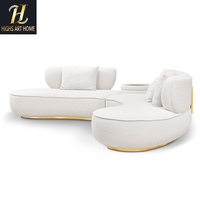 Canapé sectionnel contemporain en bouclette crème italienne avec base en acier inoxydable doré pour villa et hôtel