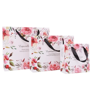 Bolsas de papel blanco personalizables de alta calidad laminadas reciclables con hermoso diseño personalizado - Product Image 3