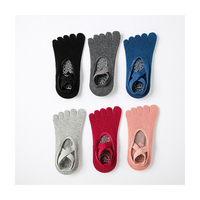 Chaussettes OEM de haute qualité en velours pour femmes Chaussettes à bout fendu Chaussettes de yoga à cinq doigts