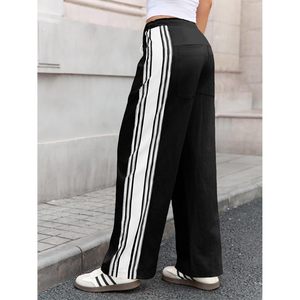 Pantalon palazzo ample à rayures pour femme, taille haute, avec cordon de serrage et poches - Product Image 3