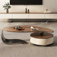 Table basse mobile de salon design moderne lumière de luxe haut de gamme Style antique surface solide créative motif de feuille spécial