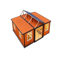Maison conteneur extensible à double aile, villa pliable, maison préfabriquée portable, toit solaire, porte panoramique en verre