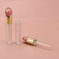 Vente en gros de tubes à gloss à lèvres en plastique de bonne qualité, forme de lèvres, dorés, vides, 5 ml, tubes à gloss de luxe, logo personnalisé, cosmétiques, rouge à lèvres