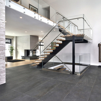 Escalier préfabriqué à poutre centrale simple en forme de L, sur mesure pour appartement et loft