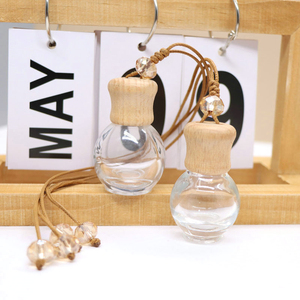 Venta al por mayor de madera vacía colgante perfume botella de vidrio colgante coche difusor botella - Product Image 1