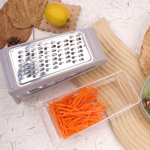 Rallador de acero inoxidable con contenedor, cortador de verduras multifunción para uso en la cocina - Product Image 1