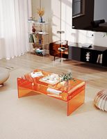 Table basse en acrylique orange avec étagère de rangement ouverte, design rectangulaire transparent en lucite, multifonctionnelle, moderne, durable, personnalisable pour chambre à coucher