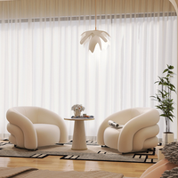 Fauteuil en tissu style crème K avec rembourrage en éponge, idéal pour petit appartement, salon ou espace de repos de magasin de vêtements