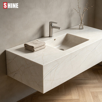 Dalle de pierre de quartz technique à veines fines gris naturel pour comptoir de bar, hall d'hôtel et décoration intérieure de villa.