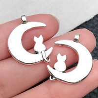 Breloque en alliage de zinc argenté antique avec motif étoile et visage de lune pour bijoux de costume d'Halloween