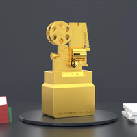 Décoration de caméra vidéo trophée en métal pour gagnant de concours photo personnalisé avec design de moulage unique Produit d'artisanat en métal